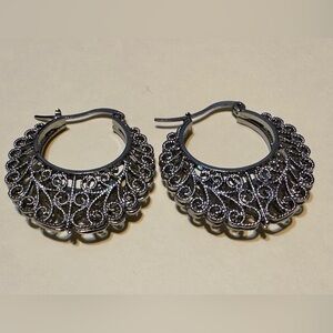 Silver tone hoop earrings